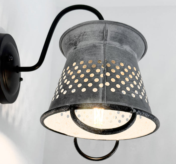 Galvanized metal colander wall sconce with rustic farmhouse character