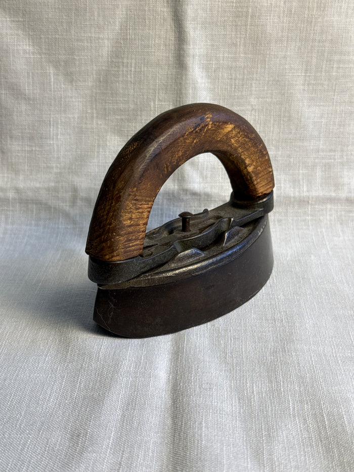 Two piece wooden Handle Sad Iron 5”