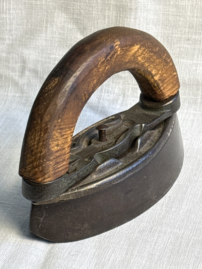 Two piece wooden Handle Sad Iron 5”