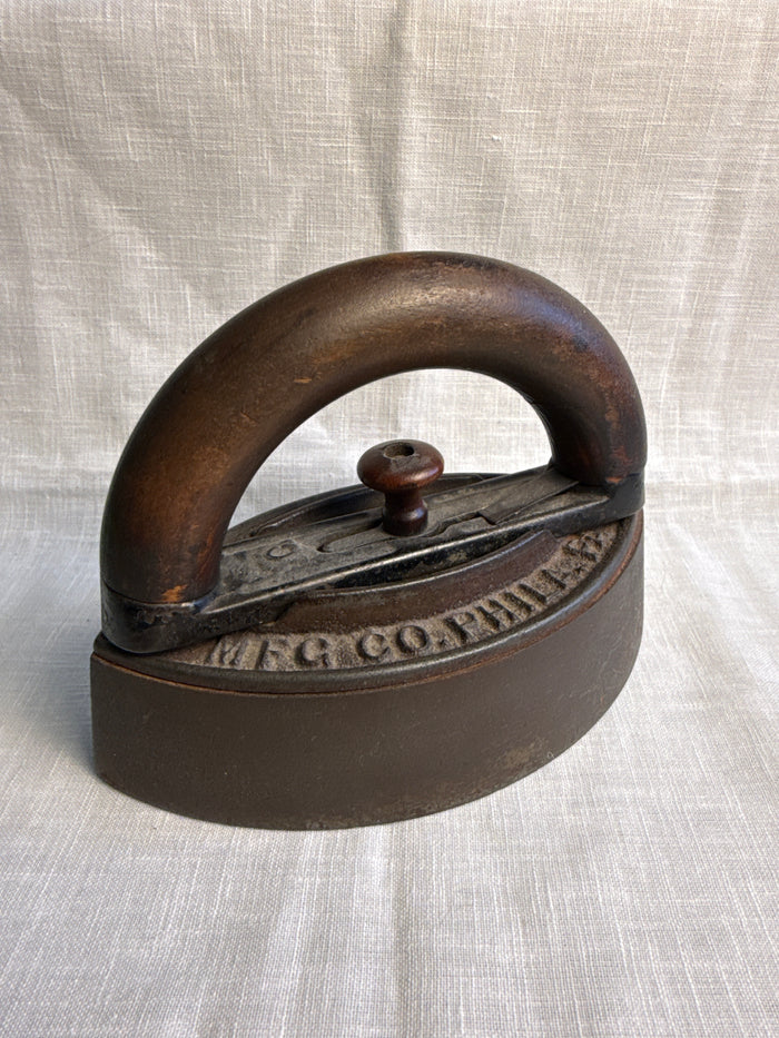 Two piece wooden Handle Sad Iron 7”