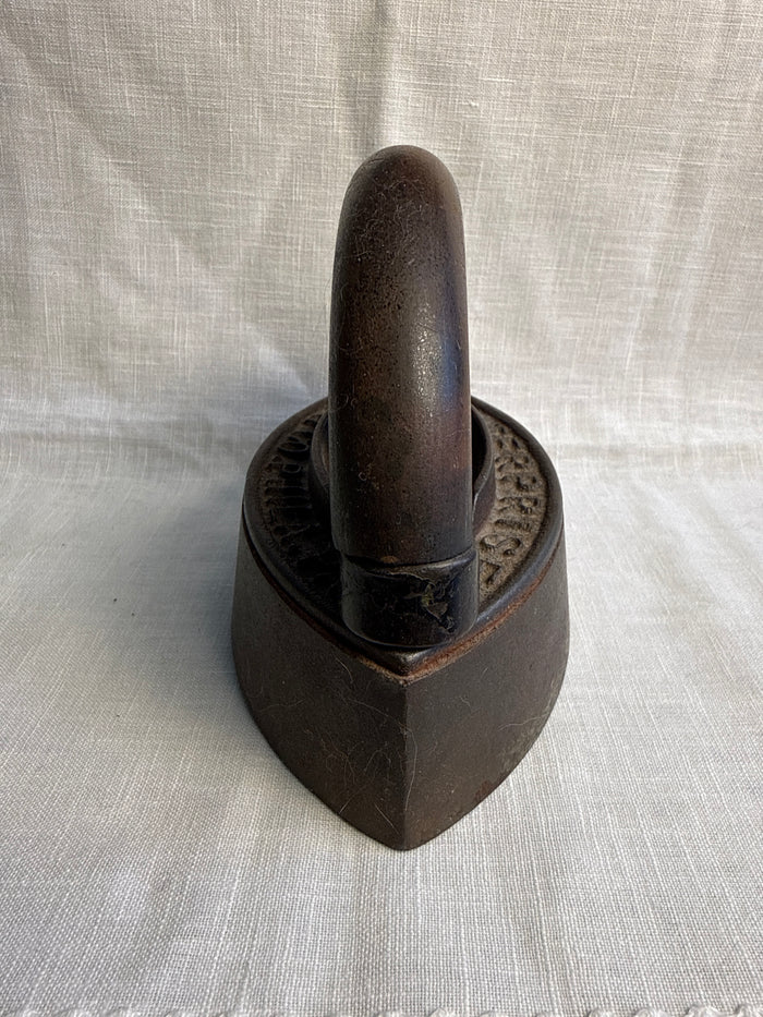 Two piece wooden Handle Sad Iron 7”