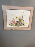Watercolor print wildflowers “in the wild” by Lyn Snow. Gold metal frame, glass encased 24x30