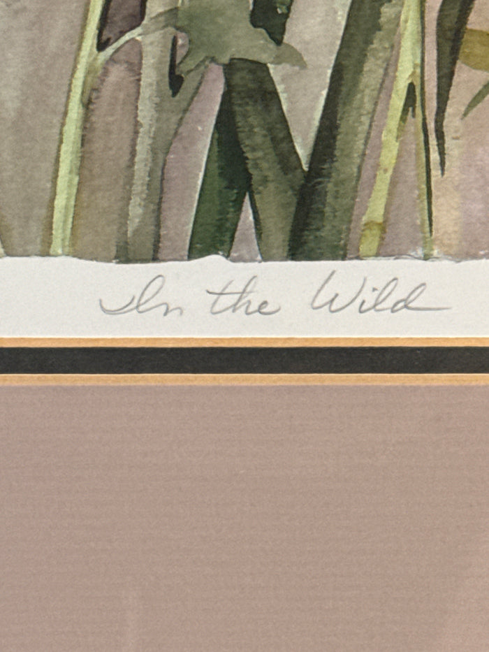 Watercolor print wildflowers “in the wild” by Lyn Snow. Gold metal frame, glass encased 24x30